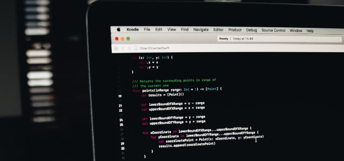 Laptop Monitor Displaying Codes
