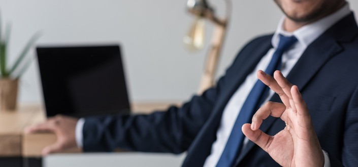 Businessman Showing Okay Sign