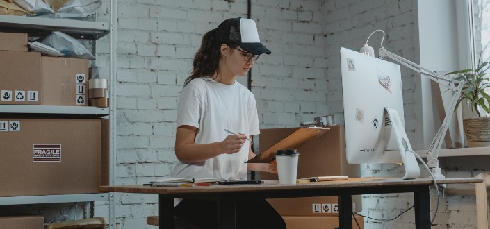 Focused Woman looking at Documents