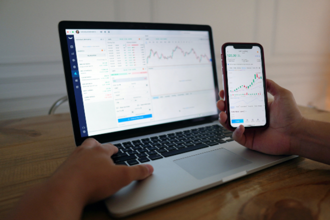 Person analyzing data in two devices