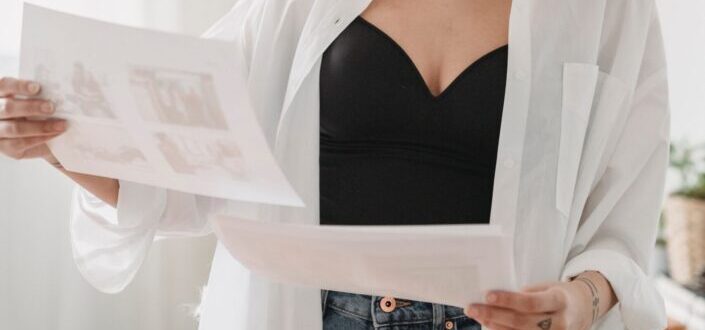 Woman Looking at Papers