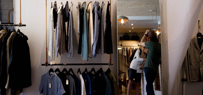 person checking out his outfit