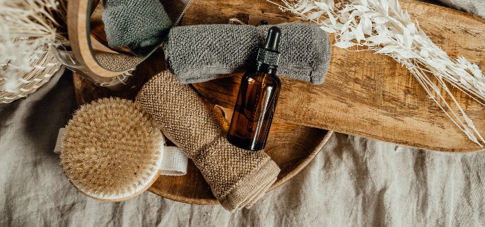Bottle and Face Towels on a Tray