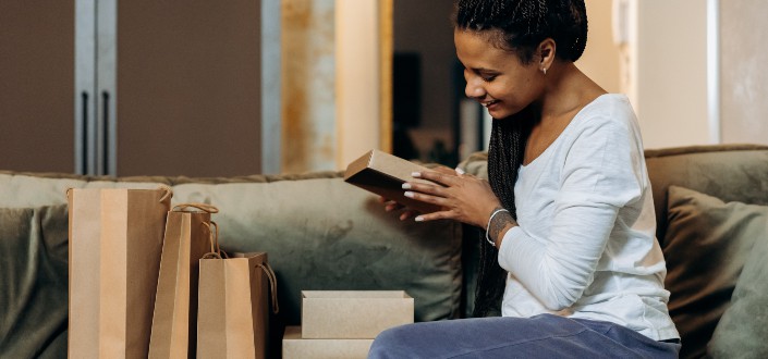 woman checking out the boxes 