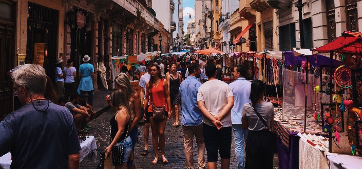 People Standing on Road Beside Market