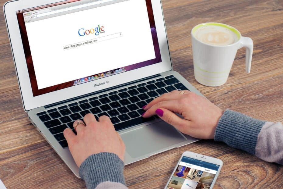 A woman typing and using Google