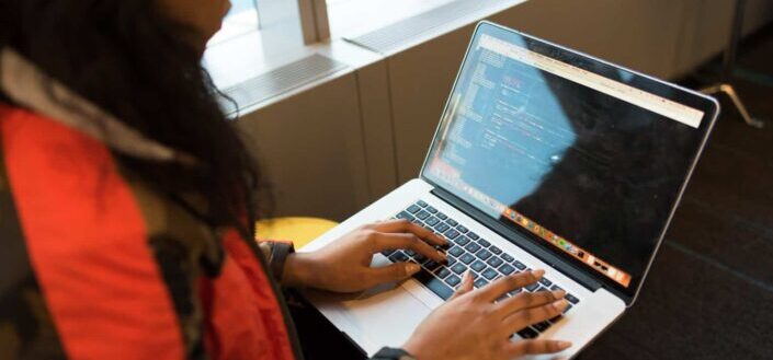 Woman Using Macbook Pro