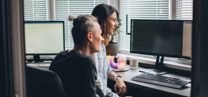 A man and woman watching together