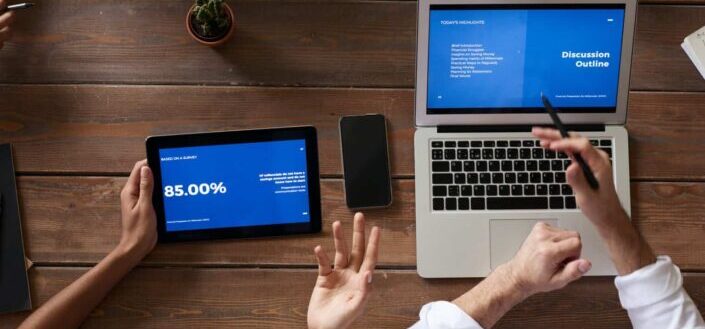 people using tablet and laptop