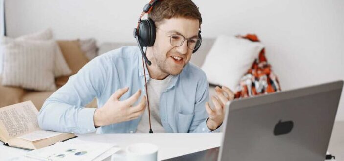 Man Communicating with Use of Laptop