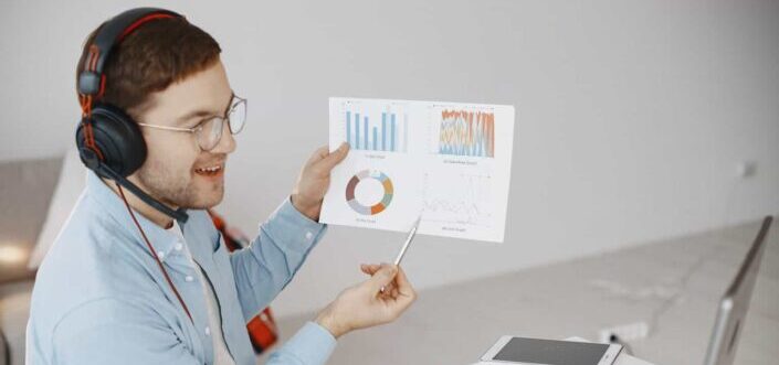 A Man Holding a Chart