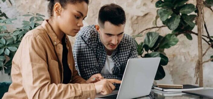 Couple Using Laptop Computer